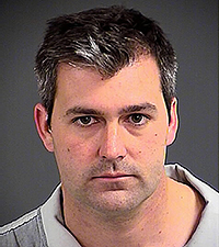 FILE - This April 7, 2015, file photo provided by the Charleston County, S.C., Sheriff's Office shows Patrolman Michael Thomas Slager. A grand jury in Charleston on Monday, June 8, 2015,  affirmed the state of South Carolina's murder charge against Slager, who is accused of shooting an unarmed black man trying to run from a traffic stop. (AP Photo/Charleston County Sheriff's Office, File)