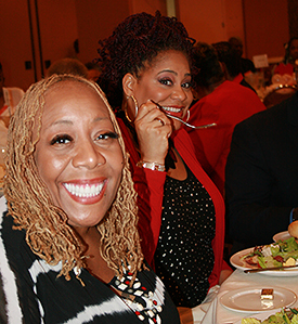 Emcee for the luncheon comedian Kim Coles sits next to WDAS-FM’s Patty Jackson. (Photo by Leona Dixon)
