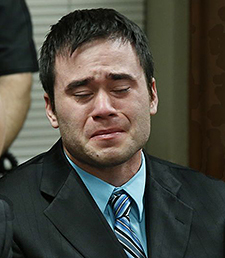 Daniel Holtzclaw cries as the verdicts are read in his trial in Oklahoma City, Thursday, Dec. 10, 2015. Holtzclaw, a former Oklahoma City police officer, was facing dozens of charges alleging he sexually assaulted 13 women while on duty. Holtzclaw was found guilty on a number of counts.  (AP Photo/Sue Ogrocki, Pool)