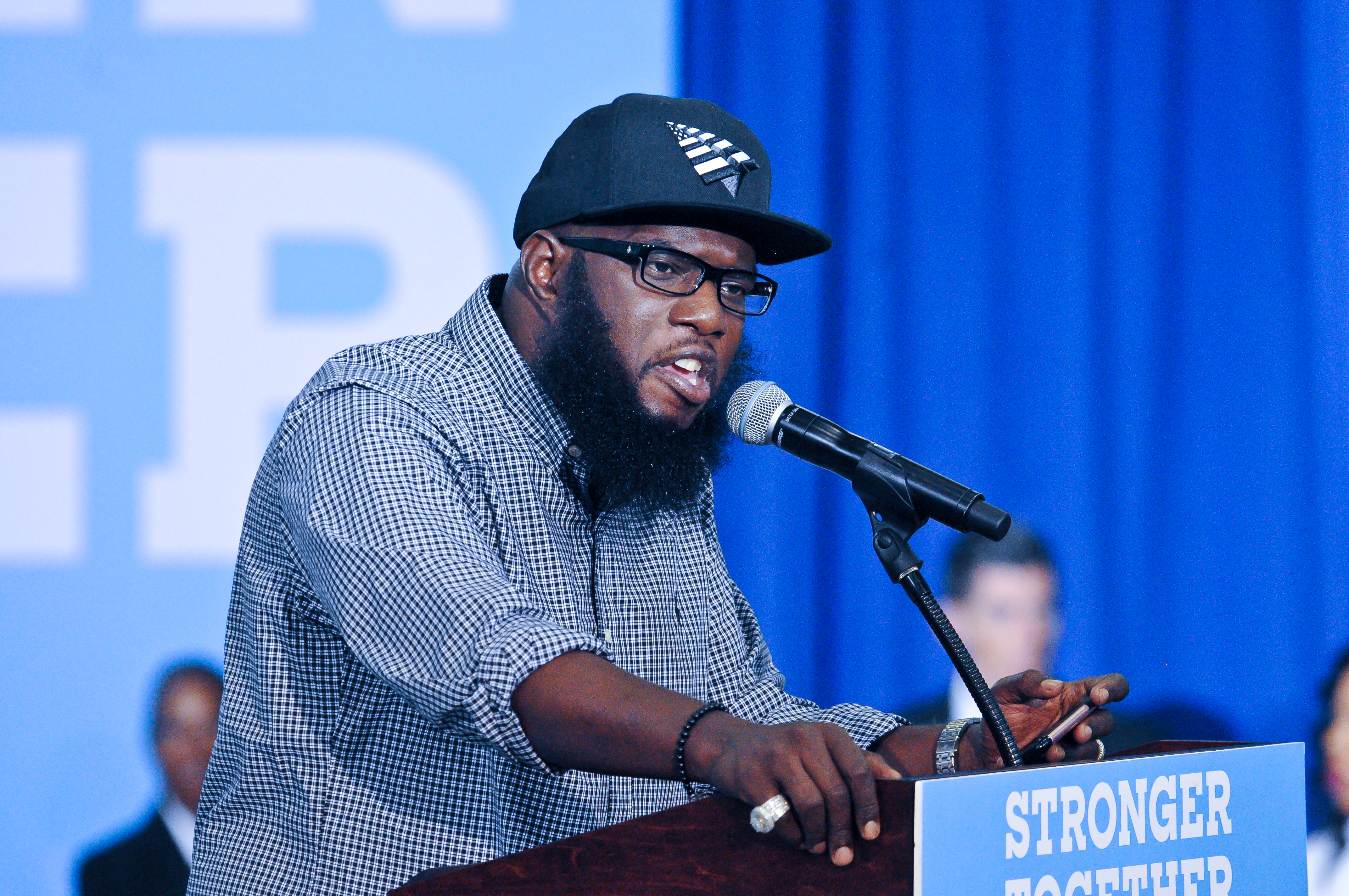 Hip Hop artist Freeway addressing crowds in support of Hillary Clinton's campaign at West Phila. H.S.