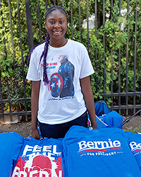 Vendor Mariah Sims with her Bernie Sanders merchandise.