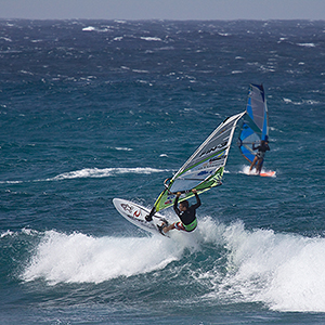 Popping a Wheelie. Windsurfing on Maui’s famous Ho’okipa Beach, located on the windy North Shore.  (Photo: Steve Smith / Shutterstock.com)