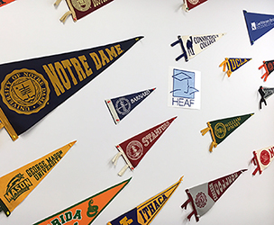Pennants from colleges that have accepted HEAF students recognize achievement and inspire dreams.  (Photo: Harlem Educational Activities Fund)