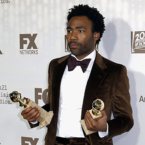 Donald Glover, winner of the award for best performance by an actor in a television series - musical or comedy for "Atlanta", arrives at the FOX Golden Globes afterparty at the Beverly Hilton Hotel on Sunday, Jan. 8, 2017, in Beverly Hills, Calif. (Photo by Willy Sanjuan/Invision/AP)